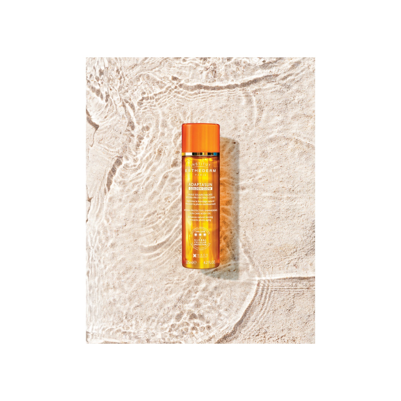 Cолнцезащитное масло с шиммером Golden Glow Adaptasun купить в VISAGEHALL